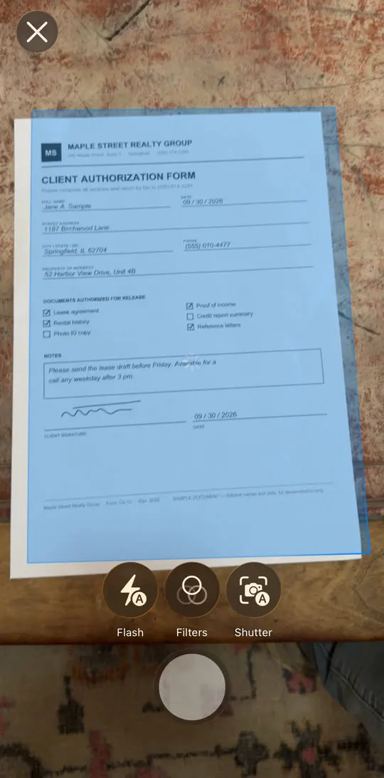 Scanner camera detecting the edges of a sample form, highlighted in blue